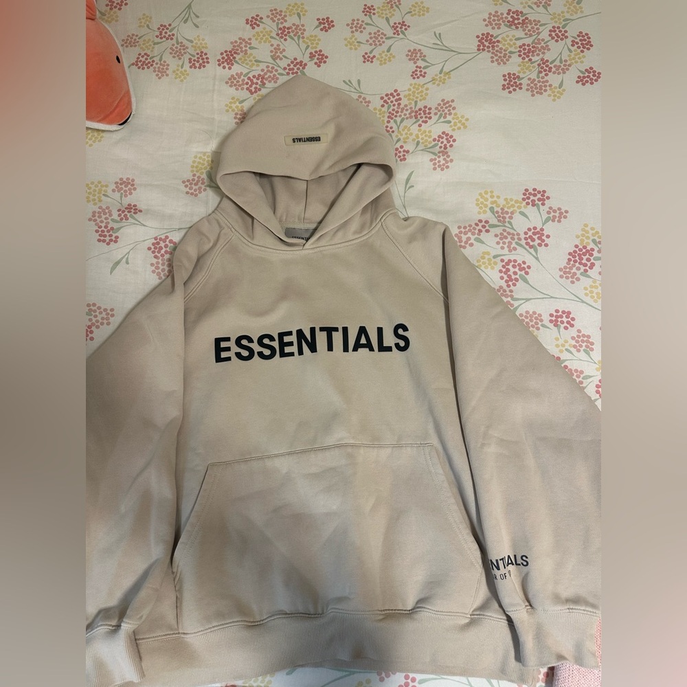 Beige Hoodie with Black ESSENTIALS Logo